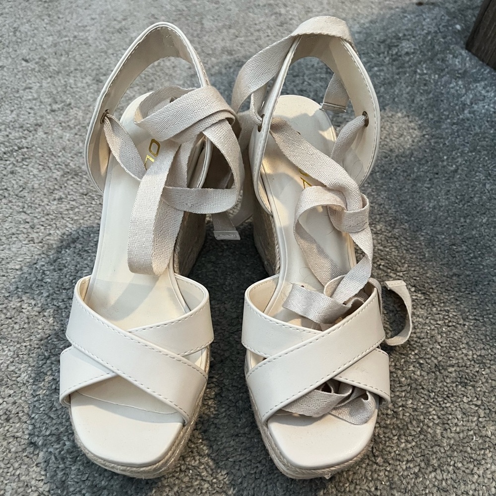 Lace up wedges.